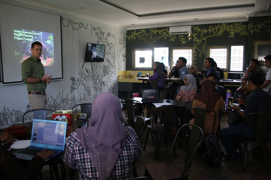 Alexander Mossbrucker teaches a group of Indonesian students at the Wildlife Conservation Center